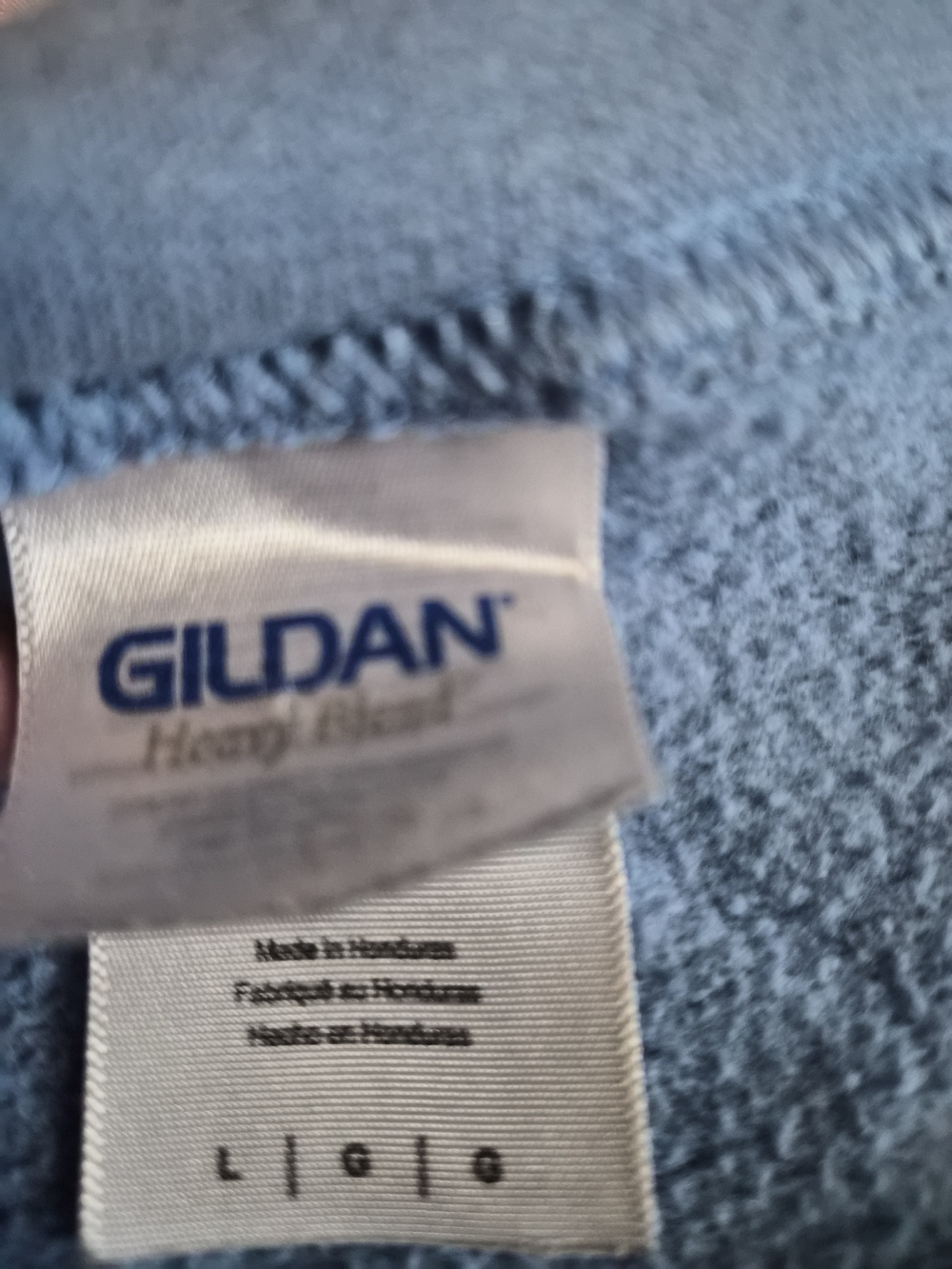 Gildan Light Blue Heavy Blend Sweatshirt Label Close-Up